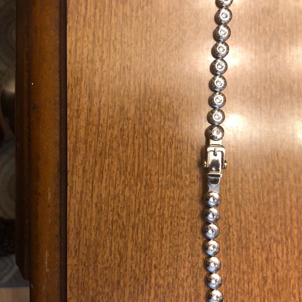 Classic Henri Bendel belt bracelet